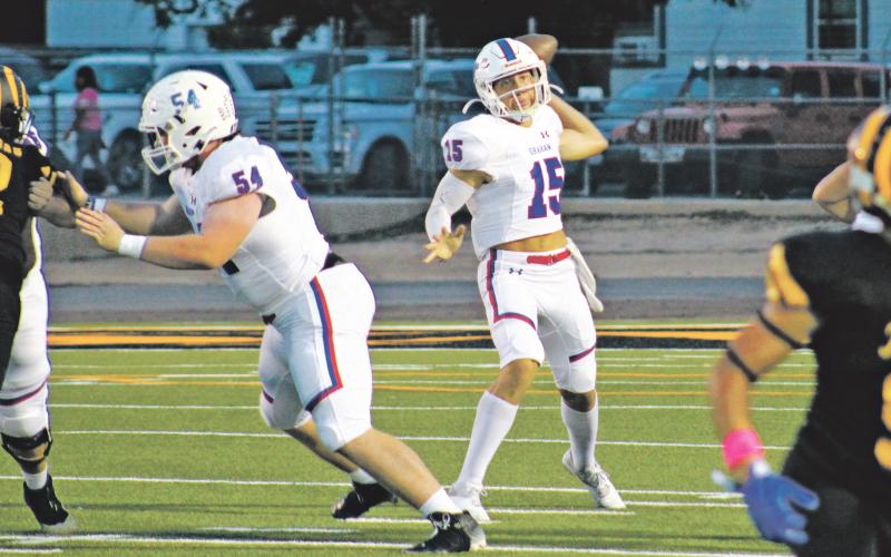 (MIKE WILLIAMS | THE GRAHAM LEADER) Steers sophomore quarterback Ty Thompson (pictured throwing a pass on Friday, Oct. 14 at Snyder) threw for a varsity career-high of 355 yards during the Steers’ 21-14 win on Friday, Oct. 28 at Midland against the Rangers.