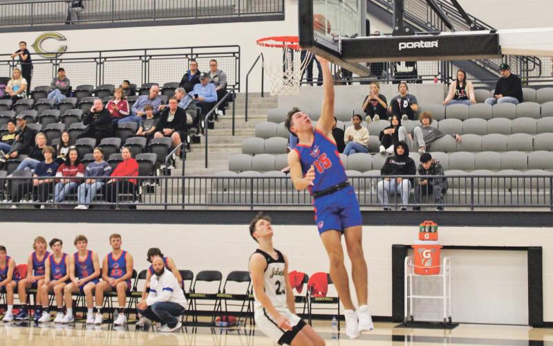 sophomore Ty Thompson earned a breakaway layup during the fourth quarter of the Steers’ 73-42 loss Tuesday, Nov. 22 at Cleburne High School. Thompson finished the game with a team-high 11 points in the road loss.