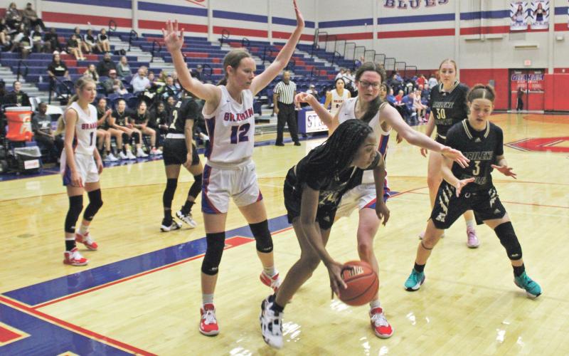 (MIKE WILLIAMS | THE GRAHAM LEADER) After a strong early first quarter that saw the Lady Blues in the lead, the team struggled to overcome scoring runs throughout the game  Tuesday, Nov. 15 at Graham High School against Abilene High School.