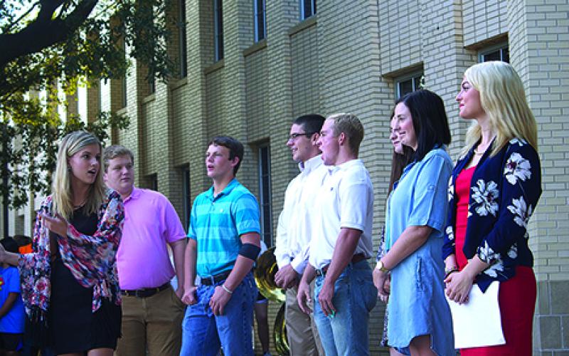 Graham High School Student Council officers get ready to present the 79th annual DAR flag-raising ceremony, held Wednesday morning at GHS. Shown here are, l-r, Molly Talbott, Jeff Hazlett, Kolton Gough, Joel Jones, Cy Holt, Elizabeth Routon, Madi Meacham and Jessica Burgess.