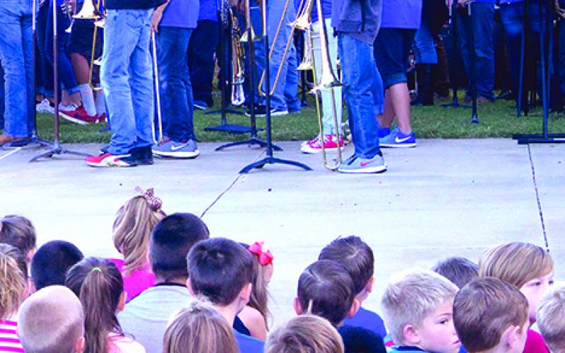 Crestview Elementary students gather to watch the Graham Junior High Band perform during the Crestview Homecoming pep rally Thursday morning. 