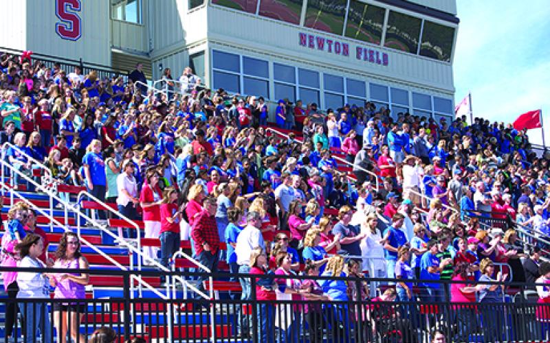 Spectators fill the stadium at Newton Field during the GHS Homecoming pep rally on Thursday afternoon.