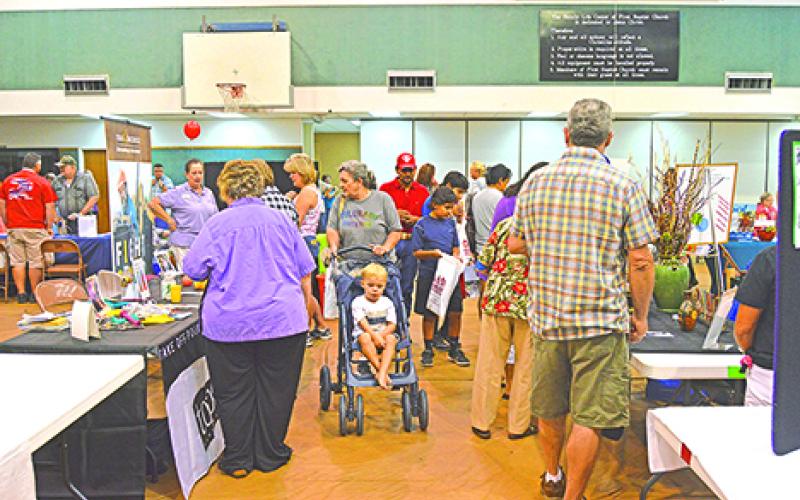 Members of the community and visitors from far and wide come out to the annual Graham Community Health and Wellness Fair to see booths of health related companies in the area.