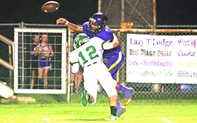 Newcastle’s Spencer Bryant laid the wood on the Throckmorton quarterback in Friday night’s 72-22 win. Leader photo by Bryan Ray