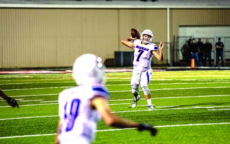 Graham quarterback Tucker Horn fired a 13 yard completion to Nick Lanham. Horn finished with an impressive 140.6 passer rating, completing 24 of his 27 pass attempts for 339 yards and a touchdown.  (Leader photo by David Flynn)
