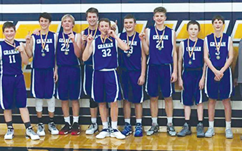 Members of the 8th grade Graham Junior High boys basketball team pose for a team photo after winning the Stephenville Tournament this past weekend. Pictured from left to right, Zack Martin, Easton Wolfe, Trent White, Daniel Gilbertson, Hunter Lanham, Gage Faulk, Raider Horn, Damien Zemsky, Luke Holland, Austin Bryant and head coach oach Trey Kramer. Courtesy photo