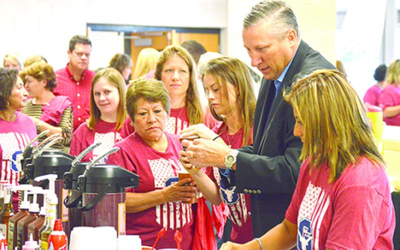 District 68 Texas State Rep. Drew Springer gets coffee with teachers at the GISD Back to School Staff Breakfast.