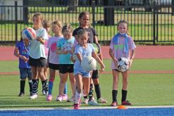 (ARCHIVE PHOTO | THE GRAHAM LEADER) Lady Blues younger soccer campers participating in a longest kick competition in July 2025. Soccer camps will be held July 21-23 and July 22-23 for different age groups.
