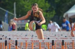 (COLTON MCWILLIAMS | CONTRIBUTED PHOTO) Newcastle’s Camren Mallory jumps over the final hurdle in the 100-meter hurdles race Saturday, May 16 in the UIL Track & Field State Meet. Mallory came away with a seventh-place finish at the meet.