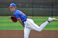 (ALEX HARVARDANSKY | THE GRAHAM LEADER) Ryder Taylor Up at the mound for the Steers pitching Friday, May 2 against the Lubbock Cooper Liberty Patriots. Taylor had a solid performance and was a bright spot for the team. 