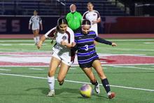 (KYLIE BAILEY | THE GRAHAM LEADER) Haley Escalante battles the ball away from a Lady Bulls player Tuesday, Feb. 3. The Defense for the Lady Blues was stout in a 6-0 shutout victory over Bridgeport. 