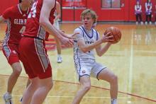 (THOMAS WALLNER | THE GRAHAM LEADER) Tyler Allen has been an asset for the Graham Steers with his speed on the court matching his skills at the net. In the district matchup Tuesday, Jan. 21, Allen helped play a role along with his teammates in the second half and showed that the Steers never give up despite the odds.