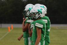 (ARCHIVE PHOTO | THE GRAHAM LEADER) The Newcastle Bobcats stand on the sideline ready for one of their weekly match ups. The Bobcats latest game against Wichita Falls Christian was canceled, however the team has a big test coming up against Jayton. 