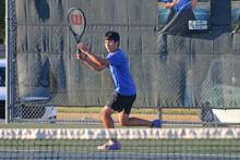 (ALEX HAVARDANSKY | THE GRAHAM LEADER) Brodey Mills prepares to swing at a ball Wednesday, Sept. 24, against Bowie. Mills won his singles match at the top of the Steers leaderboard.