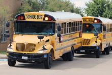(ARCHIVE PHOTO | THE GRAHAM LEADER) Buses line up at Crestview Elementary School for the first day of school of the 2025-2026 school year. Graham ISD is discussing a state mandate requiring three-point seat belts by 2029 for all buses used by the district.
