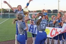 ARCHIVE PHOTO | THE GRAHAM LEADER The Graham Lady Blues softball team celebrates the program’s first area championship since 2018. The championship was won Monday, May 8 at Midwestern State University after defeating Sanger in a best-of-three series.