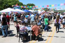 (THOMAS WALLNER | THE GRAHAM LEADER) Fourth Street on the Graham downtown square alive with activity during the Festival de Cinco de Mayo de Graham in 2025. The event will return downtown Saturday, May 2 with music, food and more.