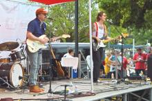 (FILE PHOTO | THE GRAHAM LEADER) Grady Spencer & The Work plays on the Graham downtown square for the Food Truck Championship of Texas in 2021. The Graham Convention and Visitors Bureau and Graham Concert Association have partnered for a series of five summer concerts on the square.