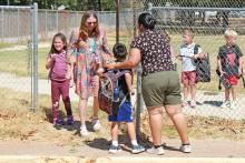 (ARCHIVE PHOTO | THE GRAHAM LEADER) Parents at Crestview Elementary School pick up students on the first day of school in 2023 with teachers assisting students. 