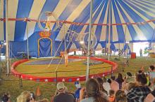 (ARCHIVE PHOTO | THE GRAHAM LEADER) Visitors to the Culpepper & Merriweather Circus in 2019 watch a show under the big tent located near the Young County Arena. The circus will be returning Monday, Sept. 30 and is sponsored by the Graham Evening Lions Club.
