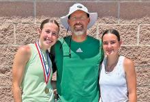 (NEWCASTLE ISD | CONTRIBUTED PHOTO) Mattie Dollar and Rae'Lynn Bennet competed Monday, April 21 in their district tennis meet in Mineral Wells. Dollar advanced to the regional tennis meet that will take place May 7-8 at the Richland Tennis Center in Richland Hills.