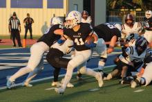 (ALEX HAVARDANSKY | THE GRAHAM LEADER) Dylan Cox runs to the outside in one of the Steers previous matchups. The Steers will play a new district opponent in Iowa Park in the upcoming seasons under the new UIL realignment. 
