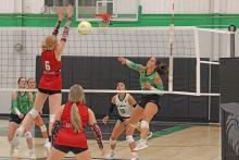 (ALEX HAVARDANKSY | THE GRAHAM LEADER) Emma Hawkins attempts to clear a ball Tuesday, Sept. 2, against the Lady Mavs. Hawkins picked up multiple points on tip plays in the match win. 