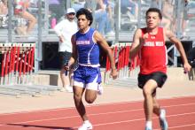 (ALEX HAVARDANSKY | THE GRAHAM LEADER) Santiago Zamora takes off during the Ram Relays. The Steers and Lady Blues headed out for their second track meet of the season Thursday, March 5 at the Hero Relays and were at the top of the team leaderboards in both the junior varsity and varsity divisions. 
