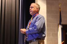 (THOMAS WALLNER | THE GRAHAM LEADER) Graham ISD Chief Student Services Officer Joe Gordy speaks with the GISD Board of Trustees during their meeting Wednesday, May 13 about the district’s Technology Department establishing guidelines for AI usage for students and staff.
