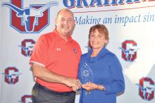 (FILE PHOTO | THE GRAHAM LEADER) Graham ISD Superintendent Sonny Cruse presents the Hall of Honor Distinguished Alumni award to Etna Wilkinson in 2018. GISD is accepting nominations for the Hall of Honor event. The deadline for applications is Thursday, Nov. 9.