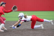 (TC GORDON | THE GRAHAM LEADER) Senior Olga Morales dives headfirst into second base in an attempted steal during one of Graham’s games in a tournament they hosted over the weekend. The Lady Blues played four games and went 4-0.