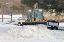 (THOMAS WALLNER | THE GRAHAM LEADER) Crews clear Cherry Street near the Graham Memorial Auditorium on Wednesday, Jan. 29 in anticipation of the Graham Chamber of Commerce Grahammy Awards which were set to be held at the auditorium later in the evening. 