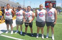 (ALEX HAVARDANSKY | THE GRAHAM LEADER) The Steers tug of war team with their championship trophy Saturday, June 21. After finishing the day in fourth for total competitions in the 4A district, it was nice to see the team end on a strong note, according to coach Lance Lefevre. 