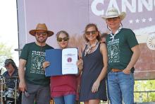 (THOMAS WALLNER | THE GRAHAM LEADER) Texas Music Office held a certification ceremony for the Graham to become a Music Friendly Texas Community at Crawfish and Cannons held Saturday, April 12. Shown from left to right are Zach Balch, Gini Mascorro, Amanda Dulany and Brendan Weatherman.