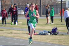 (ALEX HAVARDANSKY | THE GRAHAM LEADER) Leighton Gowens participates in the 3200m run to start the day at the Newcastle Relays. 