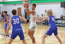 (THOMAS WALLNER | THE GRAHAM LEADER) Jacob Omundi was a key player for the Bobcats during their Tuesday, Jan. 14 matchup against Garner. Omundi provided crucial points in the last two quarters which helped push the Newcastle team ahead.