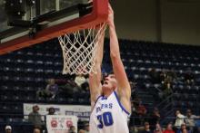 (TC GORDON | THE GRAHAM LEADER) Graham junior Cash Bowen (30) throws down a slam dunk during the Steers’ 54-35 win over Mineral Wells during Graham’s Senior Night last Friday, Jan. 19.