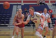 (ALEX HAVARDANSKY | THE GRAHAM LEADER) Addyson Weaver chases after a ball Friday, Jan. 9 against the Glen Rose Lady Tigers. Weaver scored four points in the Lady Blues matchup against the Lady Tigers. 