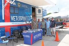 (THOMAS WALLNER | THE GRAHAM LEADER) The Mobile Vet Center from Abilene which offers free mental health services tailored to rural veterans. Shown from left to right are John Draper, Adam LaVine, David Gann, Dan Ferris and Tony Lipscomb. 