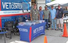 (THOMAS WALLNER | THE GRAHAM LEADER) The Mobile Vet Center from Abilene, which offers free mental health services tailored to rural veterans and their families. Shown from left to right are John Draper, Adam LaVine, David Gann, Dan Ferris and Tony Lipscomb. 