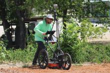 (ALEX HAVARDANSKY | THE GRAHAM LEADER) A ground penetrating radar survey is conducted Monday, July 14 by Dan Kieninger with Texas Cemetery Restoration at the Oak Grove Colored-William P. Johnston Cemetery. Shown is Kieninger pushing a GPR cart in an area behind the cemetery.