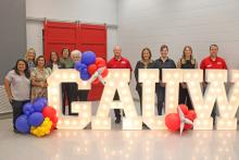(ALEX HAVARDANKSY | THE GRAHAM LEADER) Volunteers with Graham Area United Way pose for a photo during the organization’s kickoff luncheon Thursday, Sept. 18 at North Central Texas College. The organization is 47% of the way to meeting their goal of $100,000.