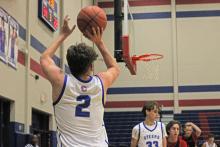 (ALEX HAVARDANSKY | THE GRAHAM LEADER) Brodie Martin fires a corner three Monday, Jan. 12 against the Abilene Hawks. Martin scored 11 points in the Steers’ 82-34 win. 