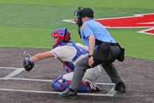 (ALEX HAVARDANSKY | THE GRAHAM LEADER) Tripp Mahaney behind the dish Thursday, April 17, for the Steers. Mahaney was awarded first team all state honors at catcher for his efforts this season.