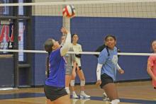 (ALEX HAVARDANSKY | THE GRAHAM LEADER) Lady Blues underclassmen practice in game scenarios in six-on-six drills. Lady Blues head coach Marci Faulk said it’s imperative that the underclassmen feel comfortable coming into official practices.