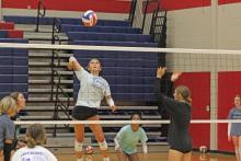 (ALEX HAVARDANSKY | THE GRAHAM LEADER) Kathryn Hughes goes up for a kill Tuesday, July 15, at Lady Blues team camp practices. Head coach Marci Faulk said the most important part of these practices is making sure team chemistry and confidence is building. 
