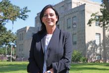 (THOMAS WALLNER | THE GRAHAM LEADER) District Clerk Jamie Land poses for a photo in front of the Young County Courthouse. Land resigned from her position Friday, Sept. 12 and will move onto her next journey as a Regional Data Coordinator with the Office of Court Administration.