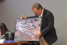 (KYLIE BAILEY | THE GRAHAM LEADER) City Manager Eric Garretty discusses portions of the wastewater treatment plant to the Graham City Council and community watching their meeting Thursday, Jan. 23. The city approved to hire Freese and Nichols as engineers to plan improvements at the facility.