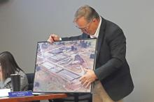 (KYLIE BAILEY | THE GRAHAM LEADER) City Manager Eric Garretty discusses portions of the wastewater treatment plant to the Graham City Council and community watching their meeting Thursday, Jan. 23. The city approved to hire Freese and Nichols as engineers to plan improvements at the facility.