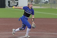 (ALEX HAVARDANSKY | THE GRAHAM LEADER) Zoey Harrell up on the mound for the Lady Blues Friday, April 18. Harrell was voted as a first team All-District Pitcher and will continue her athletic career at Austin College in the fall.